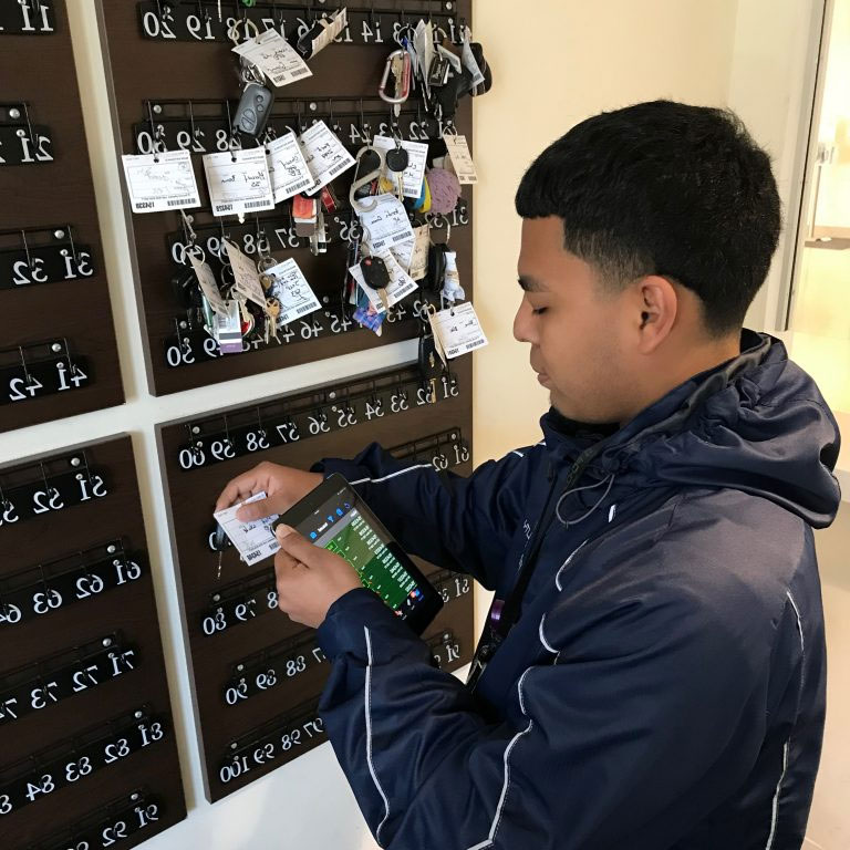 Professional valet attendants manage guest parking.