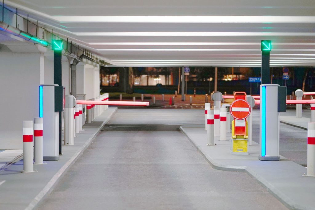 Commercial parking garage with digital signage illustrating parking dynamic pricing in action